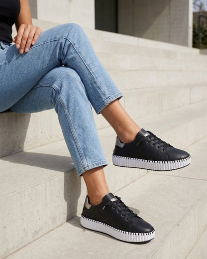 Sneakers souples à motifs ajourés - Noir